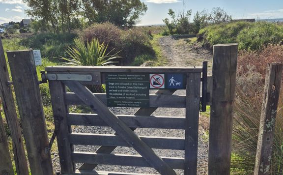 Wooden entry gate on Manly Street.