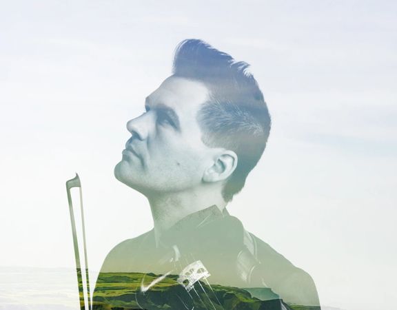Double-exposure image of a violinist with a scenic landscape layered across the portrait.
