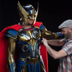 A superhero costume fitting at Wētā Workshop.