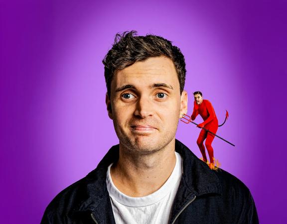 Luke Kidgell with a tiny devil version of himself on his shoulder, whispering into his ear.