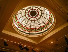 The gold and red interior of Bats Theatre.