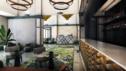 The lobby lounge in the DoubleTree by Hilton Wellington has grey chairs next to small black tables. A marble bar runs the length of the room.