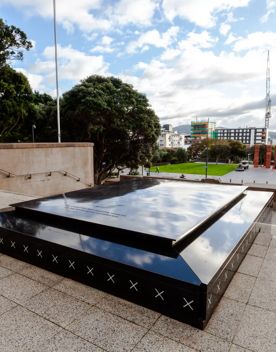 The tomb of the unknown warrior, outside the Pukeahu Hall of Memories, made of black granite.