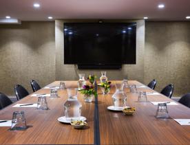 A table set up for a meeting at Mövenpick Hotel Wellington.