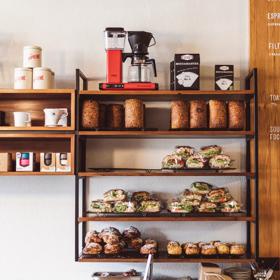 Food and jars on shelves inside Customs on Ghuznee street.