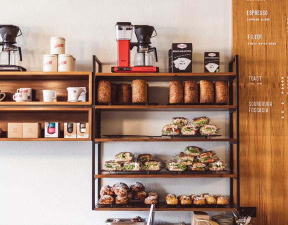 Food and jars on shelves inside Customs on Ghuznee street.