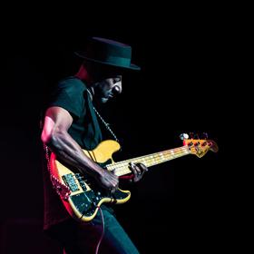 Marcus Miller playing guitar. 