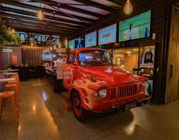 The vintage car themed interior of Gear Street Union Lower Hutt.
