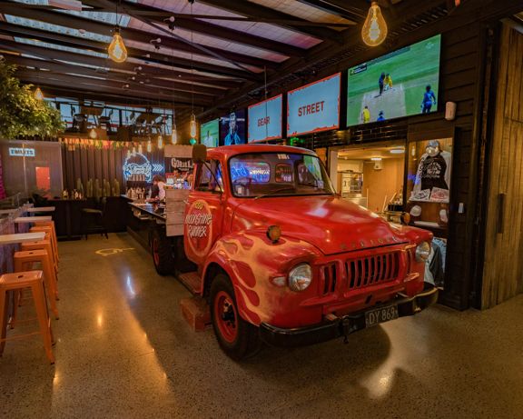 The vintage car themed interior of Gear Street Union Lower Hutt.
