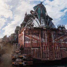 A still from the ‘Mortal Engines’ movie. Three of the engines in a row, the middle engine has the Union Jack on the front.