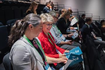 People sitting in the audience at the Life Science Summit at Shed 6 in Wellington.