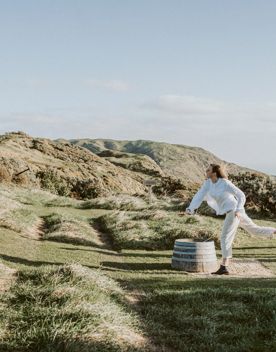 Person throwing an axe at Boomrock Lodge
