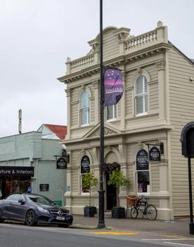 The screen location of Greytown, a historic small town featuring Victorian buildings,  stables, colonial cottages, and rural landscapes surrounding.
