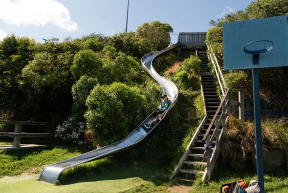 Person going down the slide at Roseneath Park.