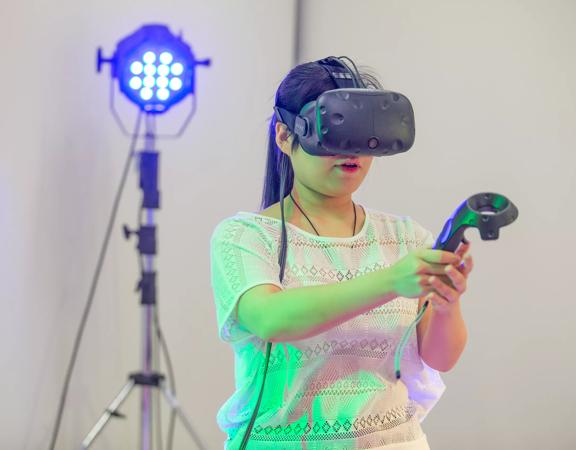 A person using virtual reality equipment in a studio at Victoria University in Wellington.