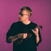 Finnish musician, Pekka Kuusisto, plucks a violin.