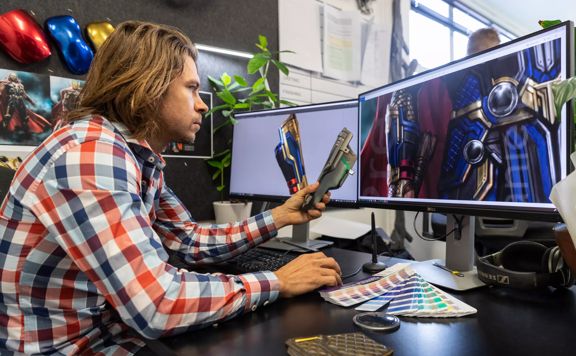 A person creating CGI at Wētā Workshop.