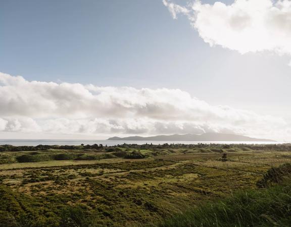 The view from the top of Mataihuka Walkway on Kāpiti Coast overlooking Raumati, Queen Elizabeth Park, and Kapiti Island.