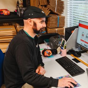 Mufftech Chief Executive Simon Stone at work on a computer.