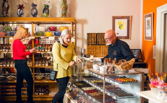 Schoc’s chocologist Murray Langham serving customers.