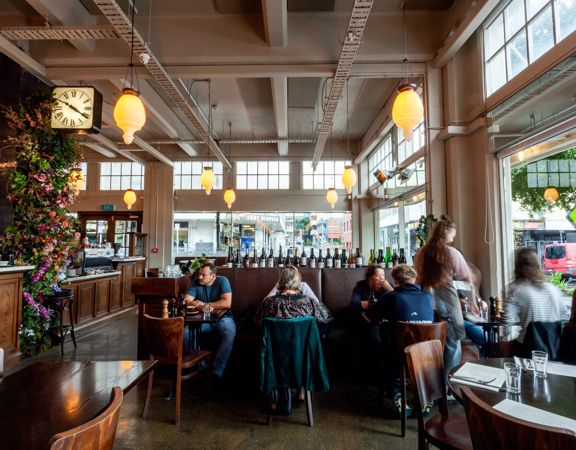 People dining inside Floriditas, a restaurant on Cuba Street in Te Aro Wellington.