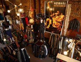 A high point-of-view shot looking down on clothing racks and various vintage pieces at Hunters and Collectors.