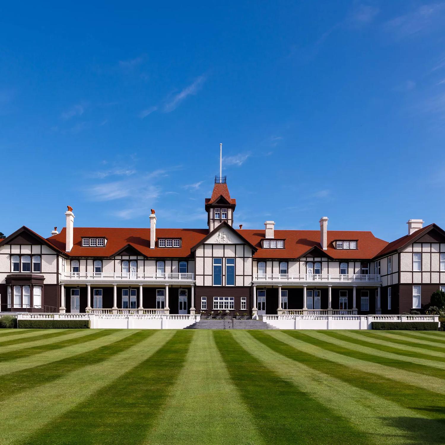 The exterior and lawn of the Government House in Wellington.