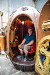 Matt Houghton of Human Dynamo sitting inside his boat he built for Avatar: The Way of the Water.