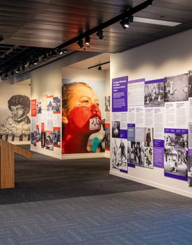 An exhibition space at He Tohu featuring interpretive panels, historic photographs and displays about New Zealand’s constitutional history.