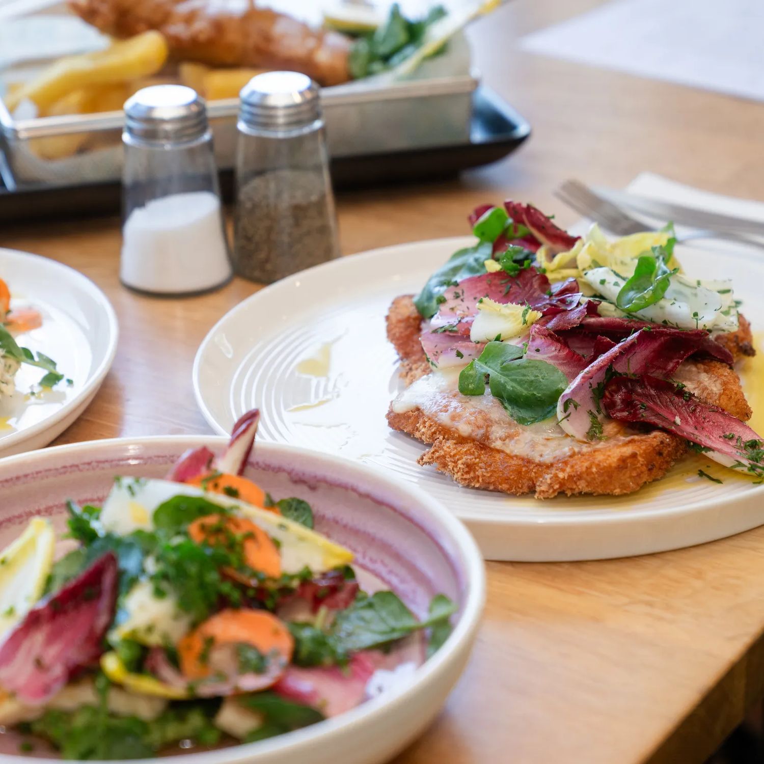 Two plates of fresh looking meals at Hotel Catalina.