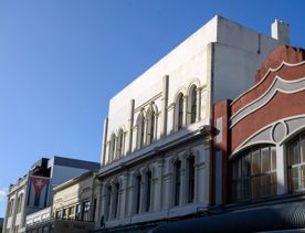 Cuba streets 19th and 20th century art deco buildings along the street.