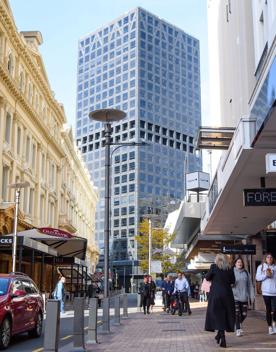 The mix of modern and old buildings along Lambton Quay, including the old supreme court, and old bank.