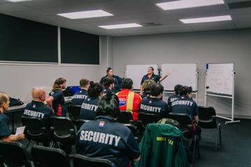 Members of the Red Badge Group sitting at a group meeting.