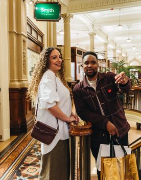 A young couple shopping at Olde Bank Arcade in Wellington.