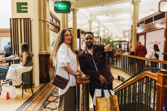 A young couple shopping at Olde Bank Arcade in Wellington.