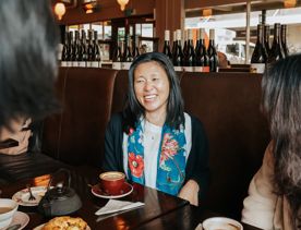 Friends enjoy coffee and scones at Floriditas.