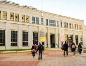 Exterior of City Gallery with people walking towards the entrance.