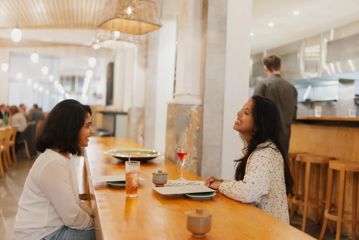 Two friends meet for brunch at Loretta.