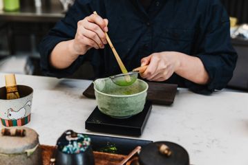 Matcha being mixed in a bowl at Matcha Lab in Wellington