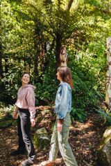 Two friends walking through the native forest at Ōtari-Wilton's Bush.