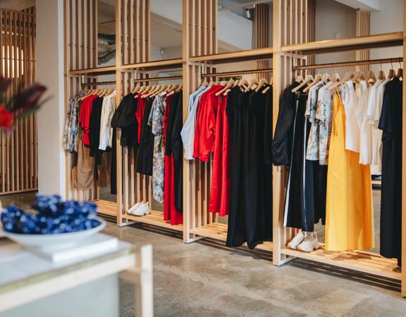 A clothing rack inside Kowtow, a boutique clothing store in Wellington.