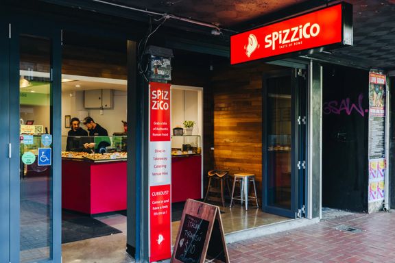 The entrance to Spizzico, a Roman-style pizzeria in Wellington.