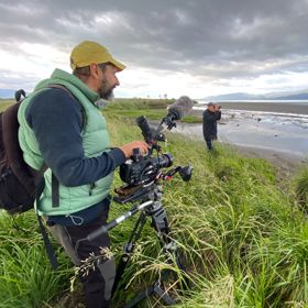 Person filming on the Ruamāhanga River