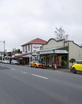 The screen location of Greytown, a historic small town featuring Victorian buildings,  stables, colonial cottages, and rural landscapes surrounding.
