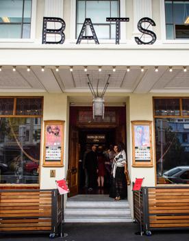 The gold and red interior of Bats Theatre.