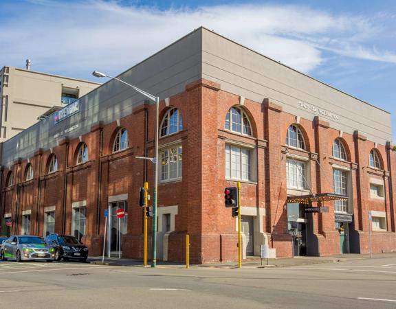 Exterior of Harbourside function centre, a large brick building.