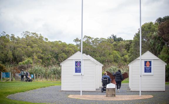 US Marine Corps Memorial with the signposted gate to the left.