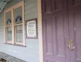 The screen location of Whiitemans Valley, nestled among trees and hills, old buildings have been built to mimic an old town.