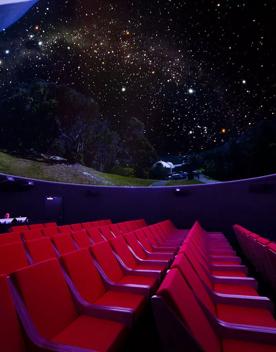 Looking up at the digital planetarium inside Space Place.