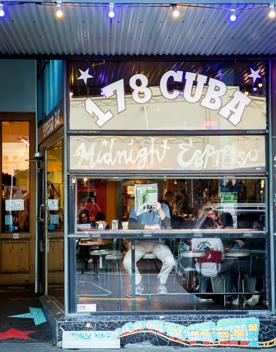 The front facade of Midnight Espresso, a bustling café located on Cuba Street in Te Aro, Wellington.